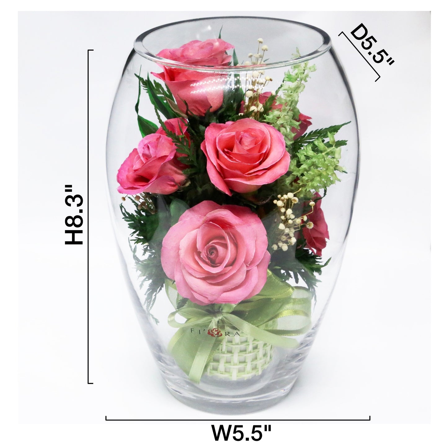 Rosy Charm: Seven Bright Pink Roses in an Elliptical Round Glass Vase