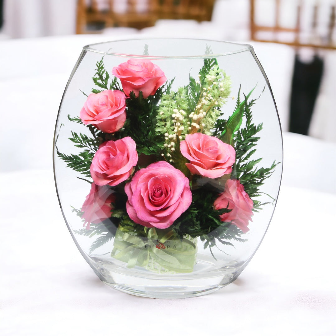 Blush: Seven Radiant Pink Roses in a Sealed Glass Vase