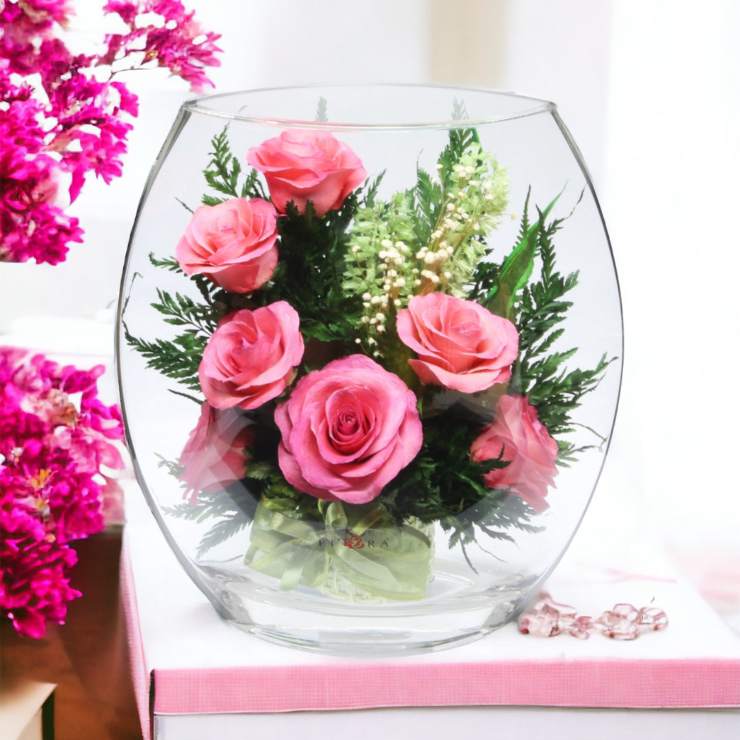 Blush: Seven Radiant Pink Roses in a Sealed Glass Vase
