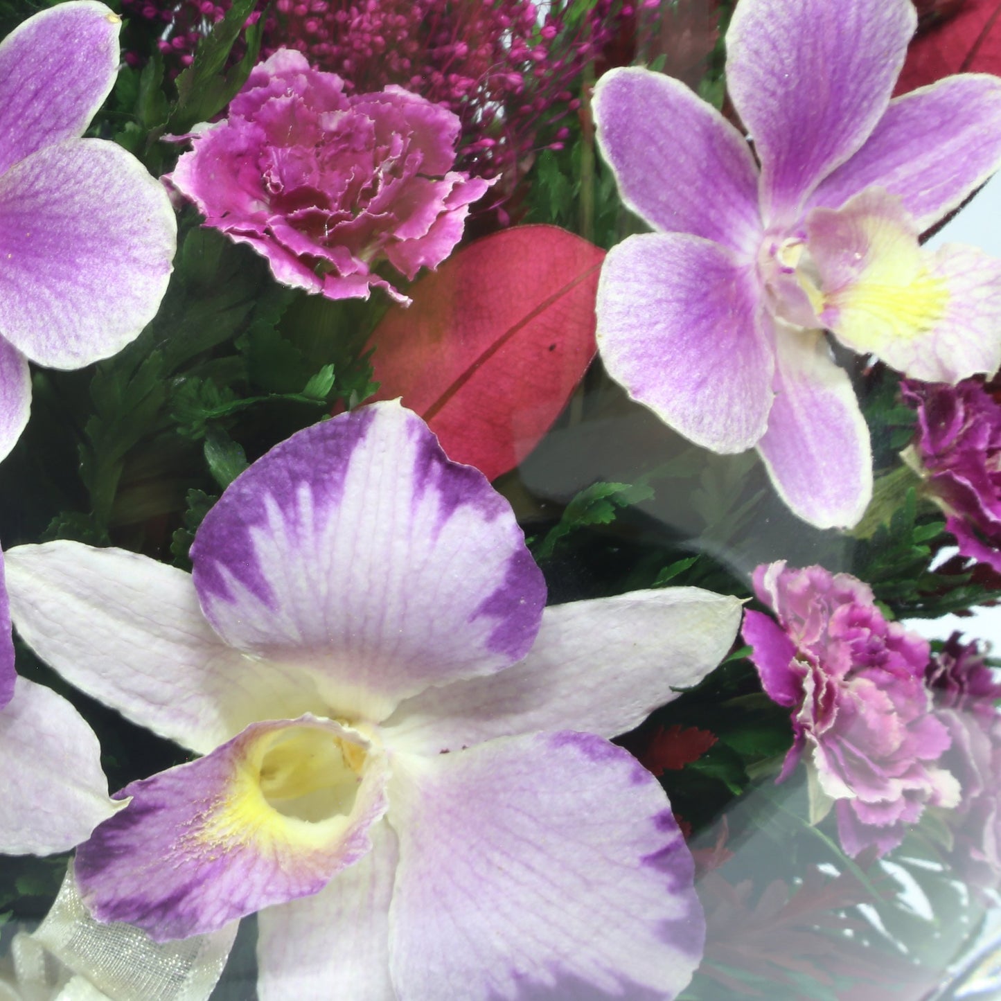 35753 Long-Lasting Purple Orchids, Limoniums with Greenery in a Flat Rugby Glass Vase - FIORA FLOWER