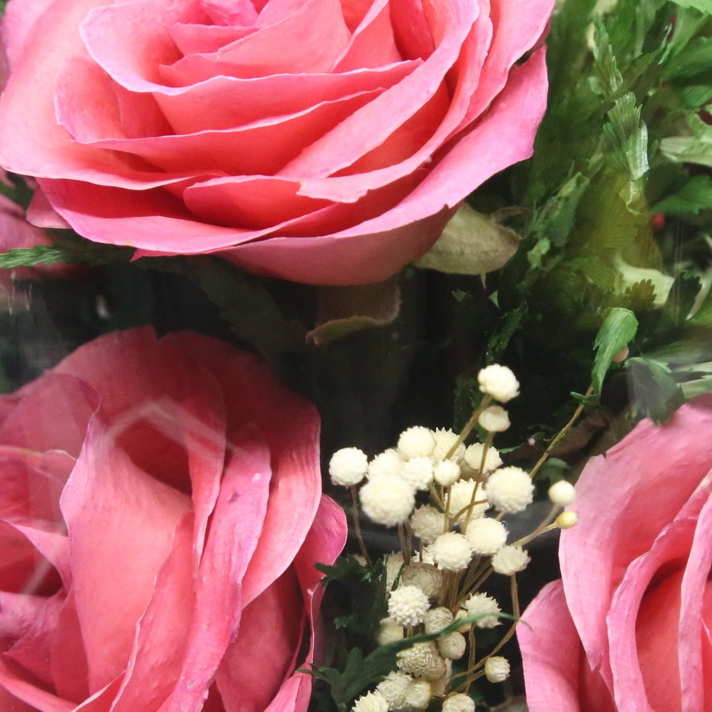 61097 Long-Lasting Pink Roses, Purple-Striped White & King Dragon Orchids, Orange Spray Carnations in an Elliptical Glass Vase - FIORA FLOWER