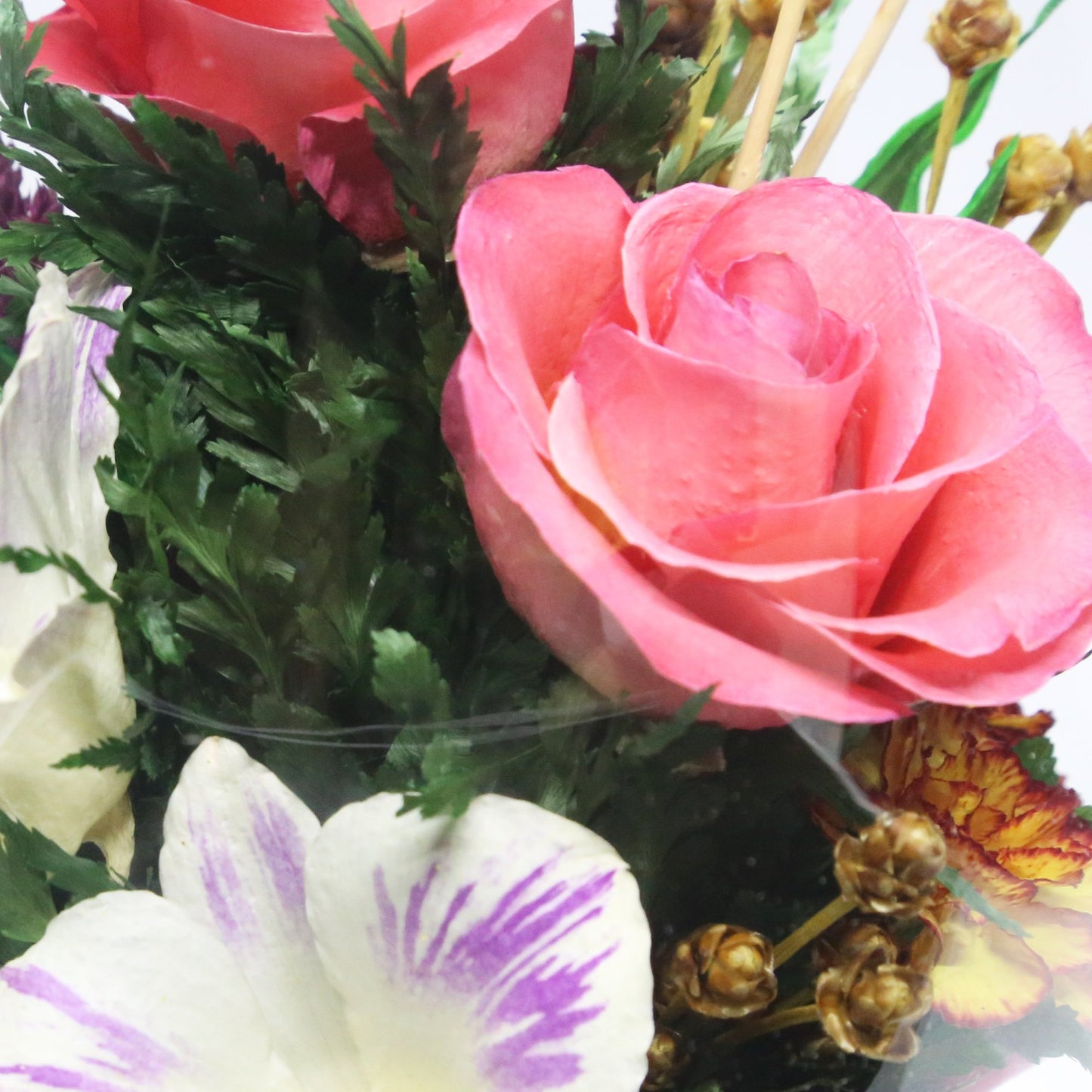 61097 Long-Lasting Pink Roses, Purple-Striped White & King Dragon Orchids, Orange Spray Carnations in an Elliptical Glass Vase - FIORA FLOWER