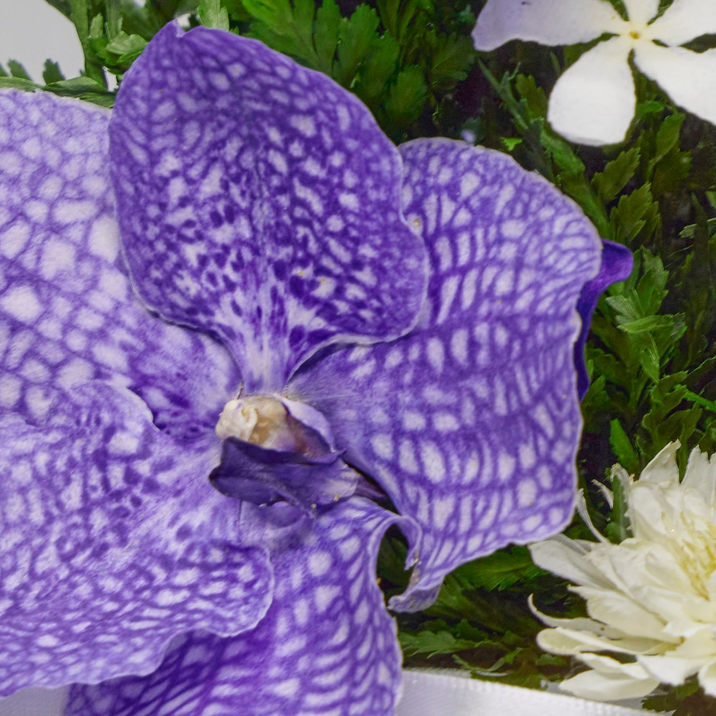 Elegant Orchid Bouquet in Lotus Bud Glass Vase