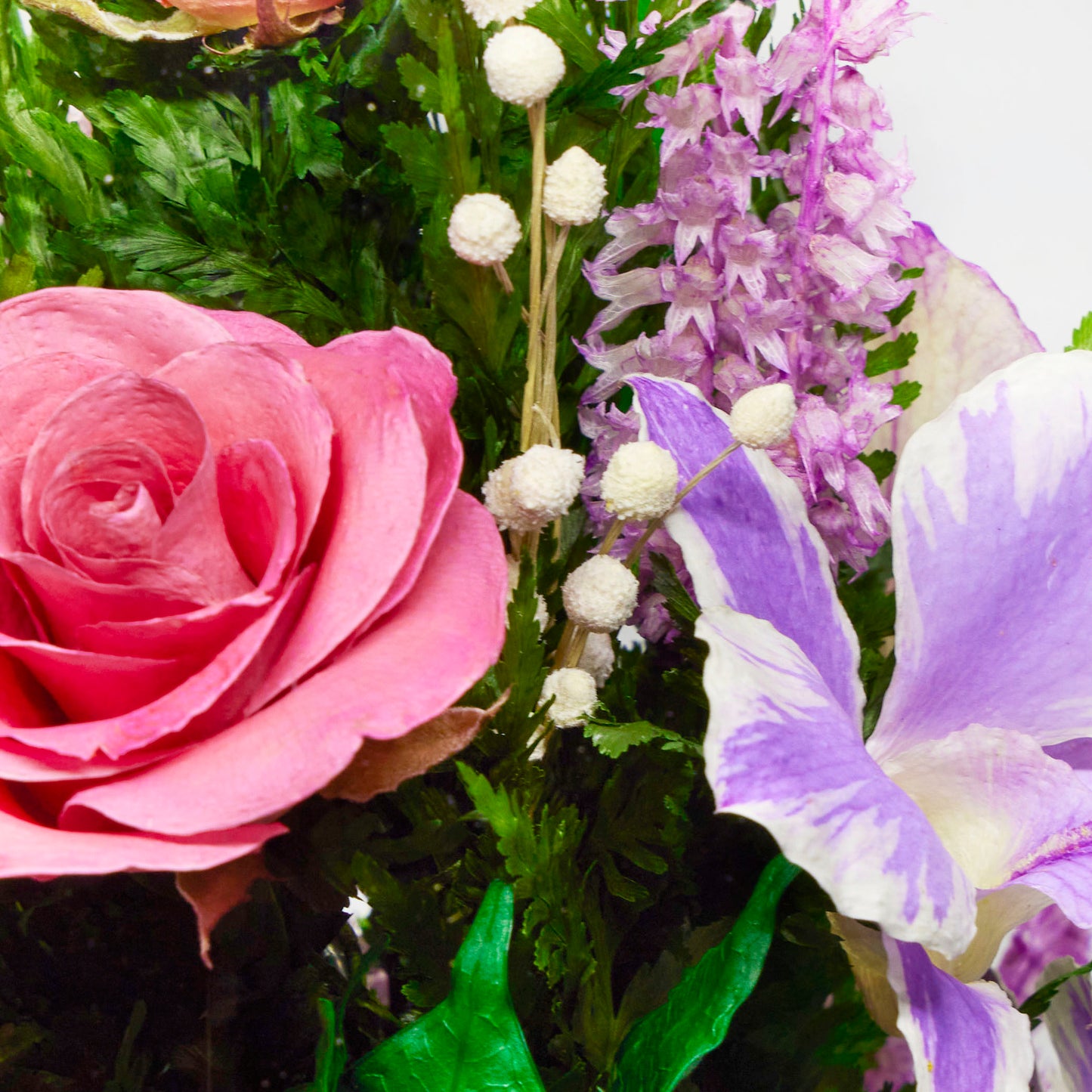 71331 Long-Lasting Purple Orchids and Roses in a Flat Rugby Glass Vase