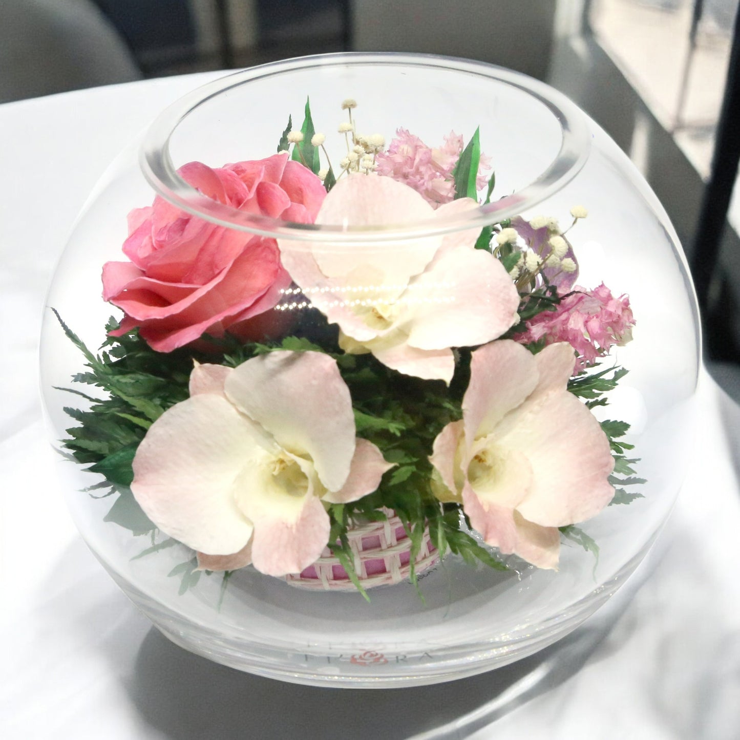 Harmony in Bloom: Eternal Pink Roses and Orchids