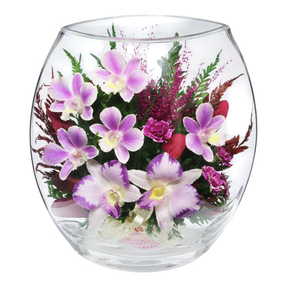 Elegant Purple Orchids in Rugby Glass Vase with Greenery