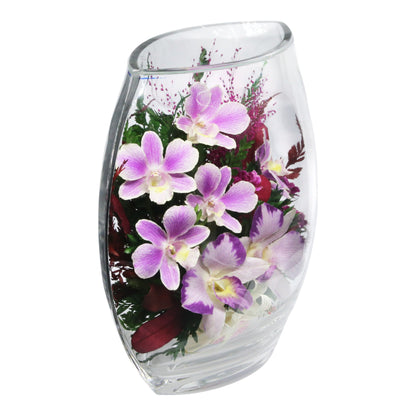 Elegant Purple Orchids in Rugby Glass Vase with Greenery