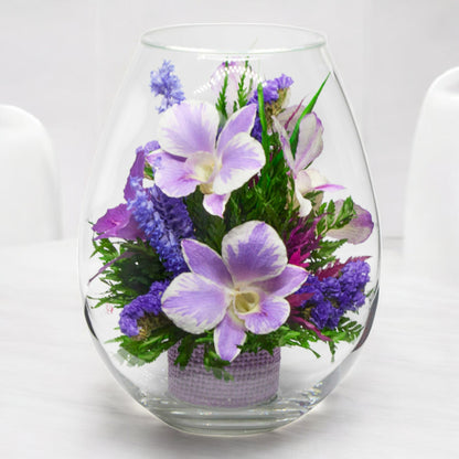 Stunning Purple Orchids in Droplet Glass Vase