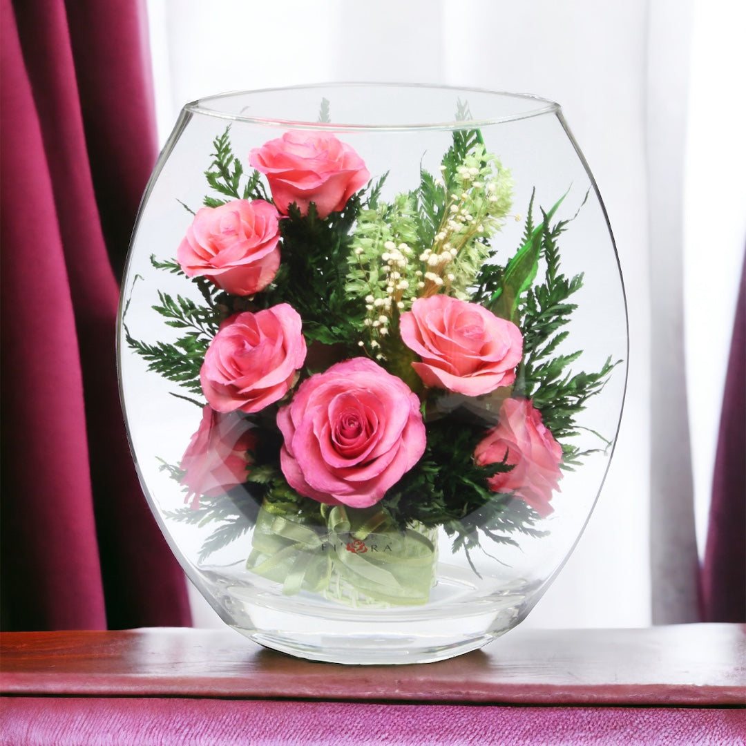 Blush: Seven Radiant Pink Roses in a Sealed Glass Vase