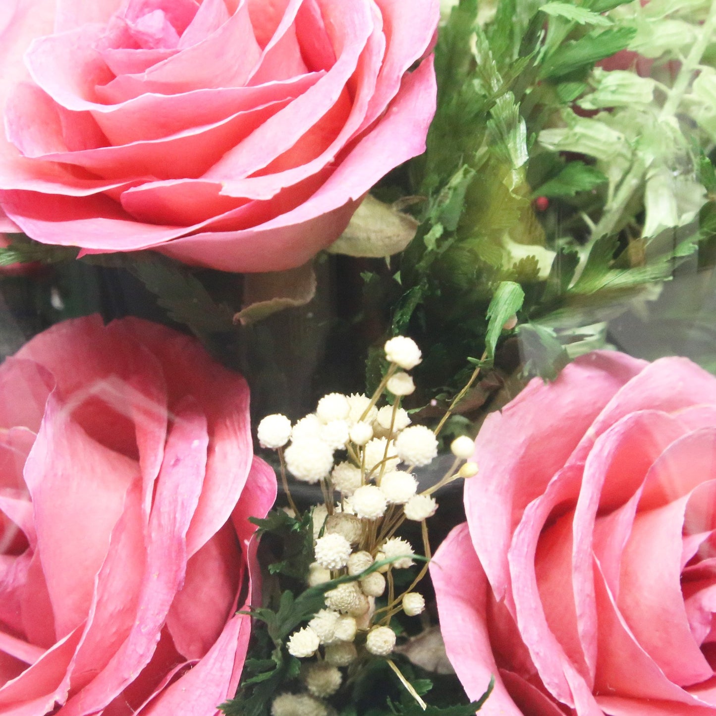 61097 Long-Lasting Pink Roses, Purple-Striped White & King Dragon Orchids, Orange Spray Carnations in an Elliptical Glass Vase - FIORA FLOWER