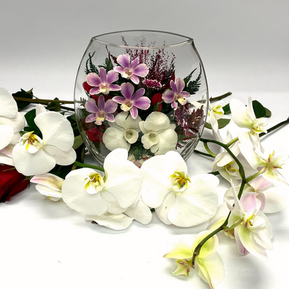 71812 Long-Lasting Purple Orchids with Greenery in a Flat Rugby Glass Vase